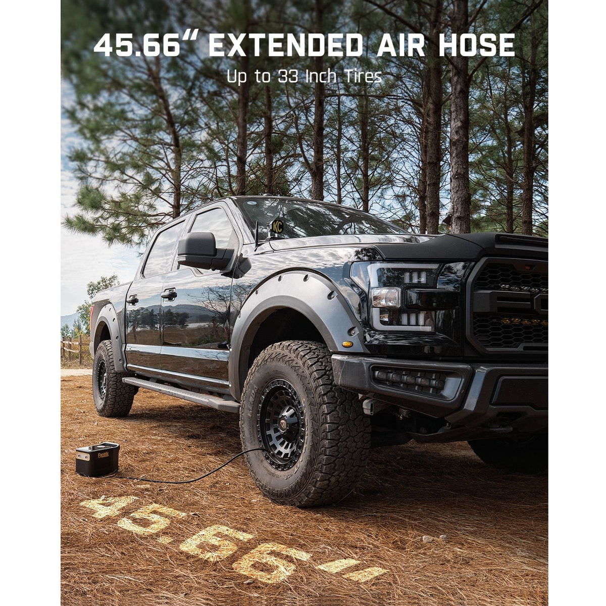 Fanttik X9 Ultra tire inflator connected to a black pickup truck with 45.66 inch extended air hose for up to 33 inch tires.
