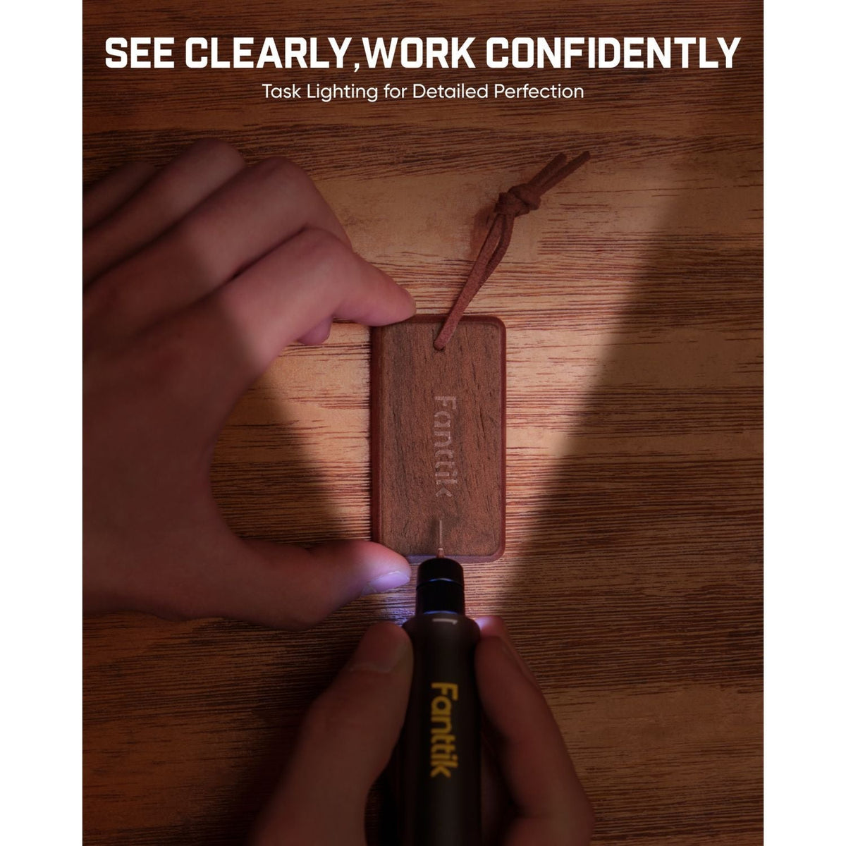 Fanttik cordless rotary tool engraving a wooden tag with task lighting